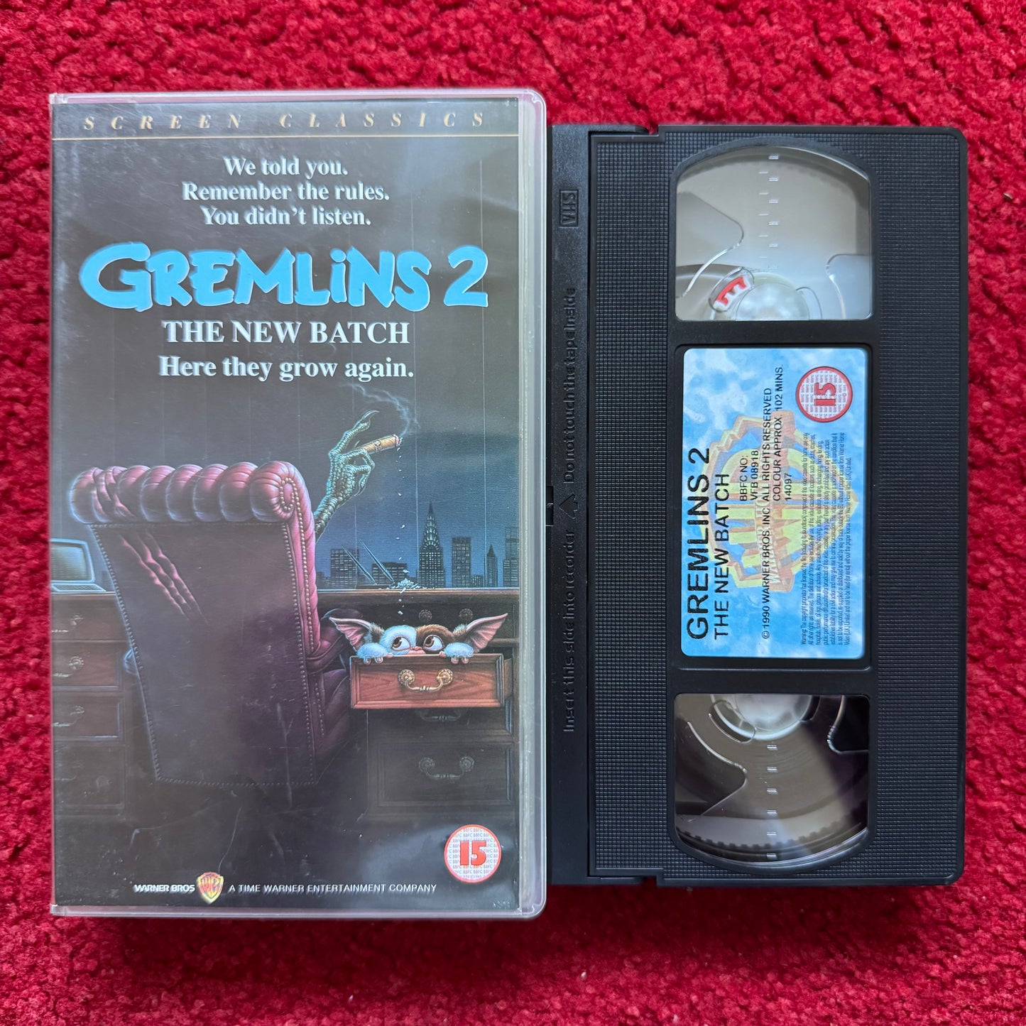 VHS tape of 'Gremlins 2: The New Batch' on a red background