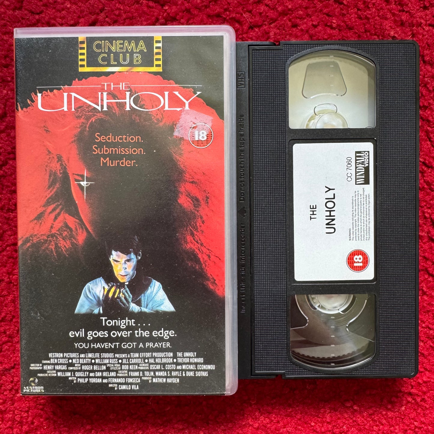 The Unholy VHS video featuring a horror film cover with dark themes and captivating artwork
