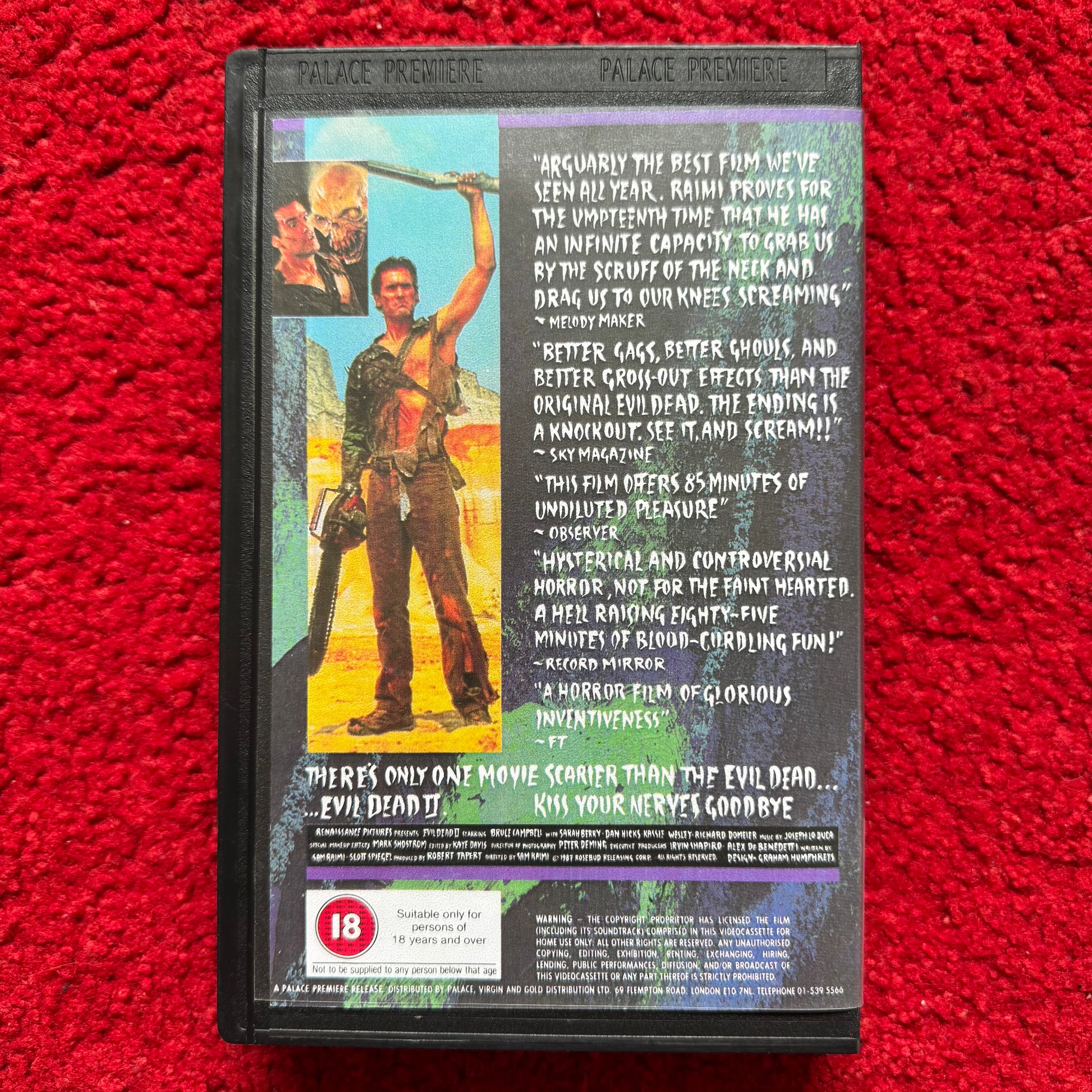 Evil Dead 2 VHS cover featuring dramatic text and iconic horror imagery for fans of the genre