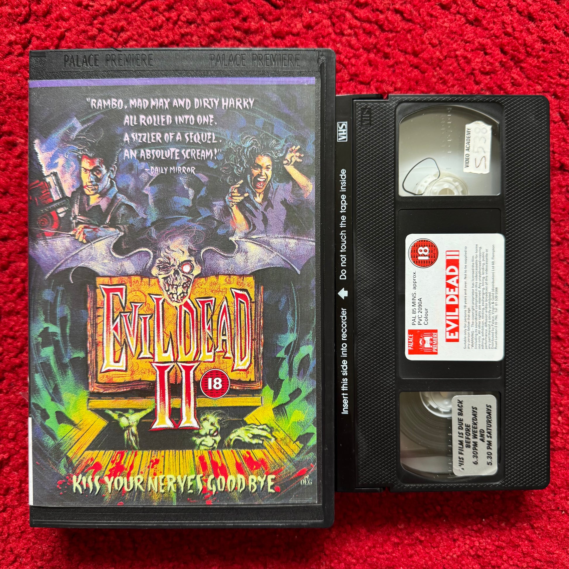 Evil Dead 2 VHS with colorful cover design featuring horror characters and spine chilling graphics