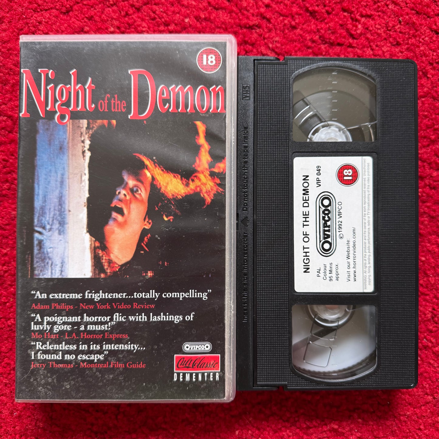 Night of the Demon VHS cover featuring a horror scene with striking imagery and vibrant colors