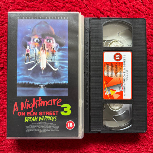 VHS tape of 'A Nightmare on Elm Street 3: Dream Warriors' with cover on a red background