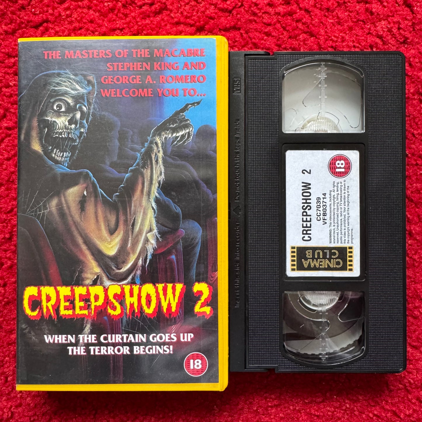 VHS tape of 'Creepshow 2' with cover on a red background