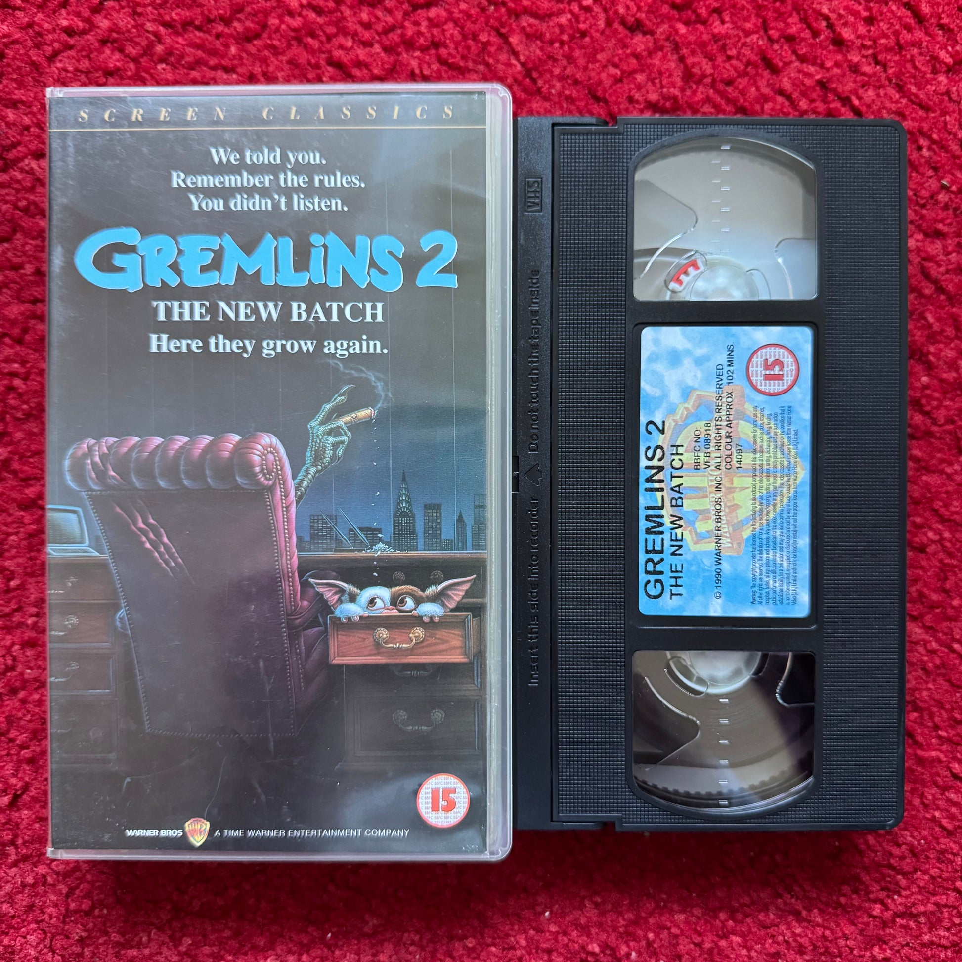 VHS tape of 'Gremlins 2: The New Batch' on a red background