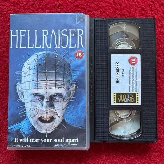 VHS tape of 'Hellraiser' with cover on a red background