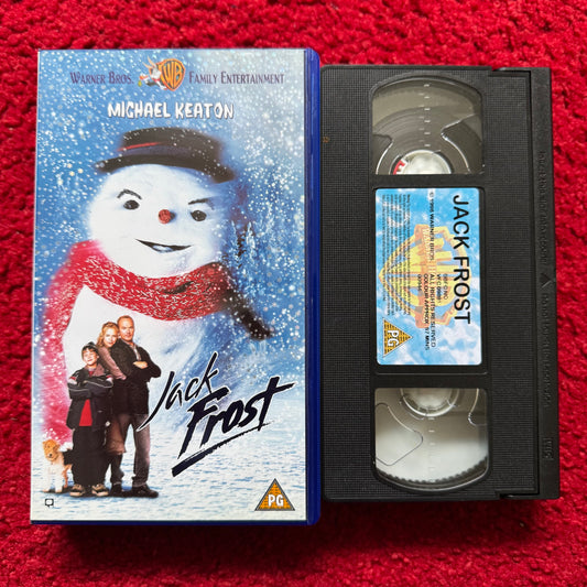 VHS tape of 'Jack Frost' with cover featuring a snowman and family on a red background