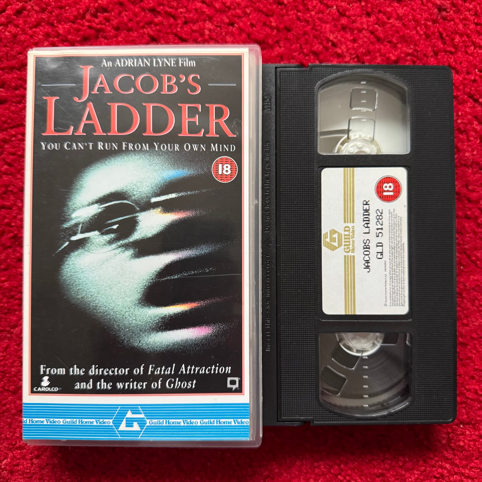 VHS tape of 'Jacob's Ladder' with cover on a red background