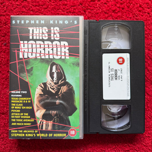 VHS tape of 'This Is Horror' with cover on a red background