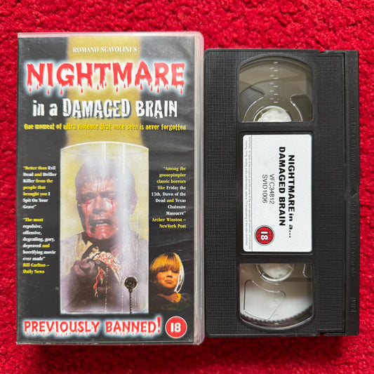 Nightmare in a Damaged Brain VHS with a striking horror cover featuring chilling artwork