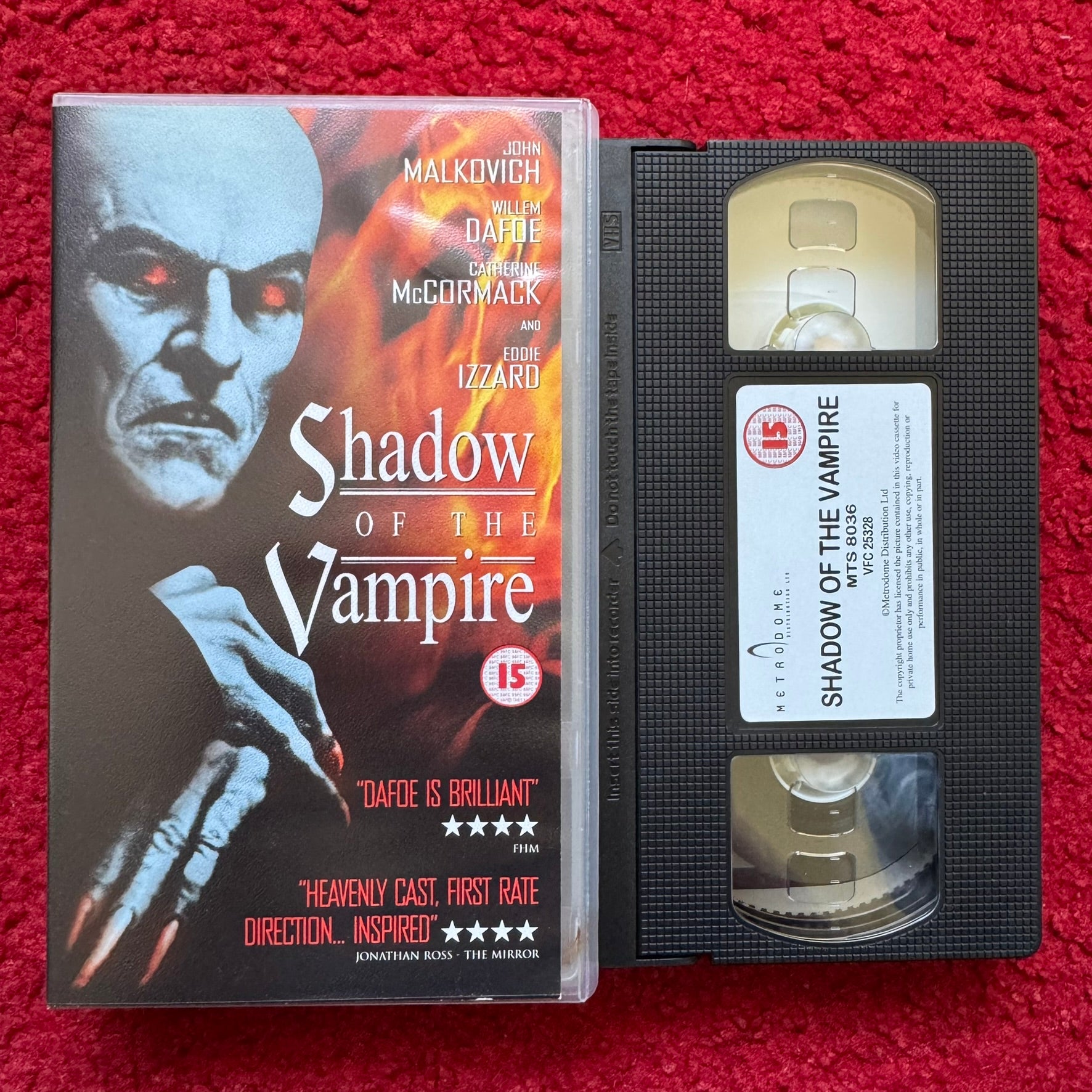 Shadow of the Vampire VHS featuring John Malkovich with striking horror-themed cover art
